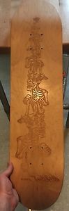 Emek Crouching Stacked Skeletons Lasercut Skate Deck