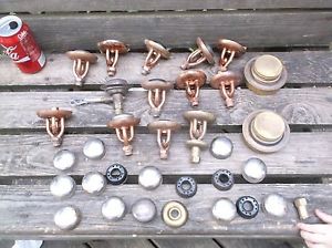 Large lot of vintage camp stoves with many spare parts burner heads and  caps