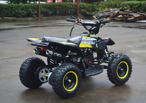 Quality atv for kids 49cc 2 stroke with adjustable speed TONS of upgrades Venom