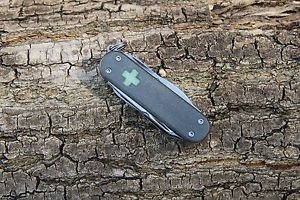 Custom Mini champ Victorinox Keychain Brass/Ti scales glow cross