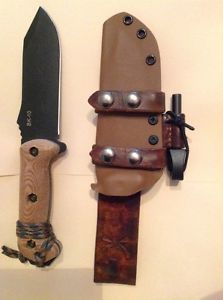 Becker BK10 with custom sheath, handles and ferro rod.  Fatwood also!